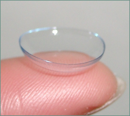 contact lens on finger